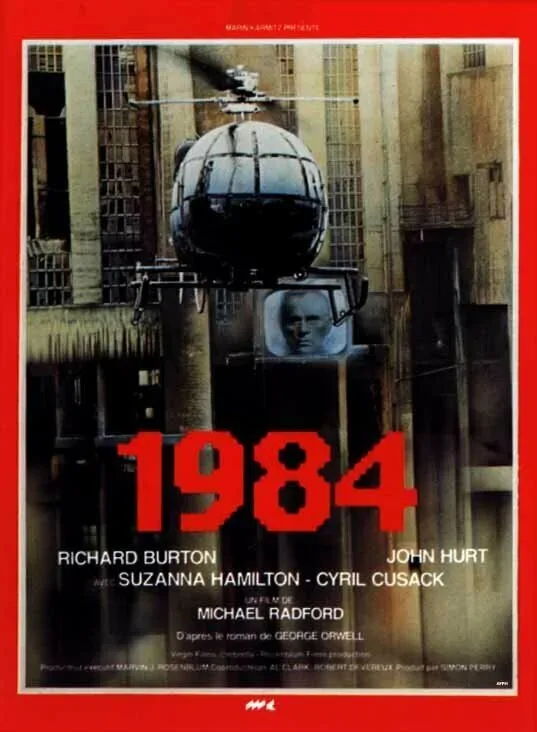 Постер фильма «1984» с вертолётом на фоне и крупной надписью 1984 Постер фильма «1984» с вертолётом на фоне и крупной надписью 1984